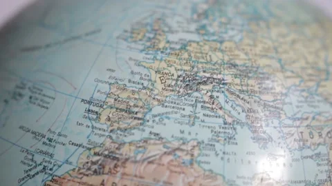 A globe rotating and showing north european countries in a shallow depth of fiel Stock Footage 167617795