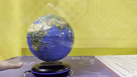A globe is spinning on a stand 스톡 동영상 276361484