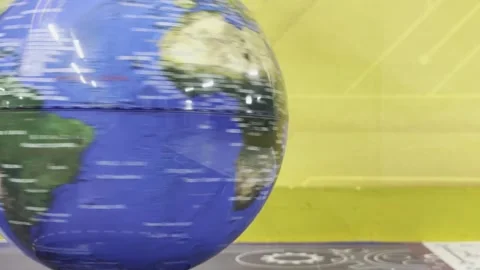 A globe is spinning on a table Stock-Footage 276361734