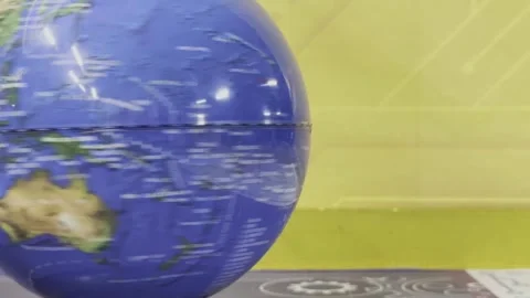 A globe is spinning on a table Stock-Footage 282297139