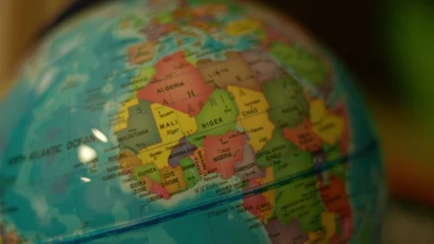 Globe spins slowly near camera lens Stock Footage 342353293