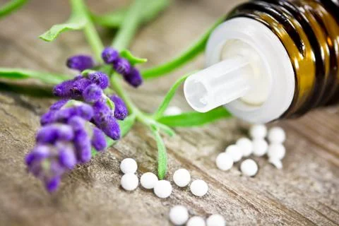 Globuli with lavender Stock Photos