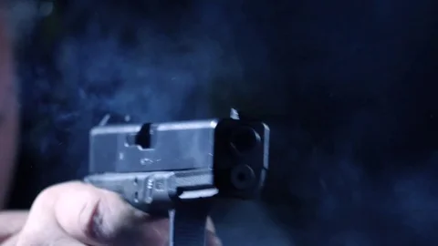 GLOCK 17 pistol shoot 1 time in slow motion Stock Footage