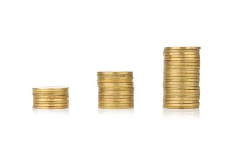 Glod coin stack. town. pile. isolated on white background Foto stock