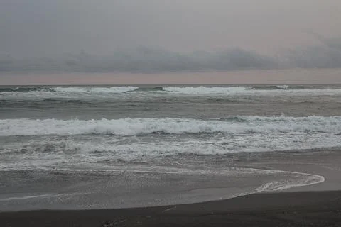 Glommy waves on the beach, vacation Stock Photos