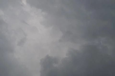 Gloomy cloudy sky. Dark clouds spreading over landscape. Heavy overcast cas.. 写真素材