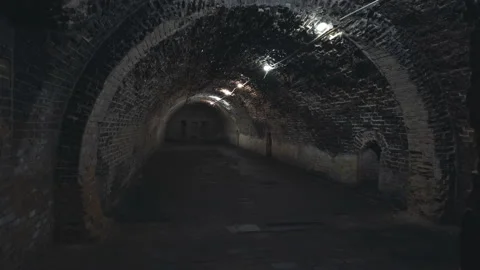 Gloomy corridor of an old dungeon. Video stock 142766871