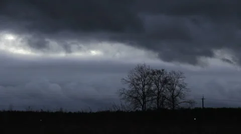 Gloomy dark clouds over the field Video stock 58631725