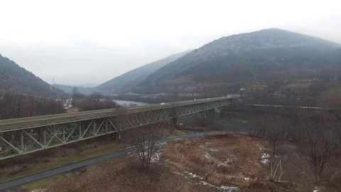 Gloomy low flyover in valley Stock Footage 71697786