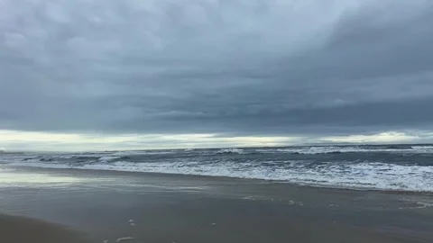 Gloomy ocean coast. Dramatic sky over the ocean. Dramatic ocean coast. Stock Footage 307314856