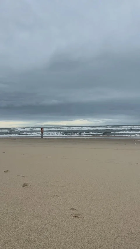 Gloomy ocean coast. Dramatic sky over the ocean. Dramatic ocean coast. Stock Footage 307315052