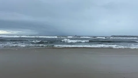 Gloomy ocean coast. Dramatic sky over the ocean. Dramatic ocean coast. Stock Footage 309007730
