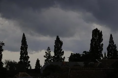 Gloomy sky with dark gray clouds. Stock Photos