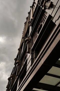 Gloomy Sky Frames Unique Architecture Stock Photos