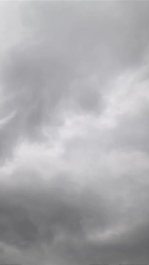 Gloomy storm display. Dark clouds swirl swiftly overhead. Violet storm clouds sc Stock Footage 337356095