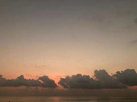 The gloomy sumset with gray clouds 写真素材