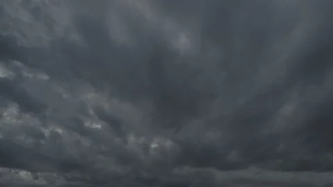 Gloomy weather with the cumulus clouds floating on the sky. Stock Footage 148782452