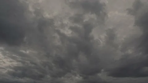 Gloomy weather with the cumulus clouds floating on the sky. Stock Footage 148782857