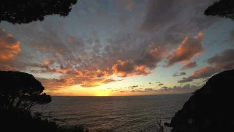 Glorious orange sunset over the Mediterranean Sea on the Cinque Terre Stock Footage 103310958