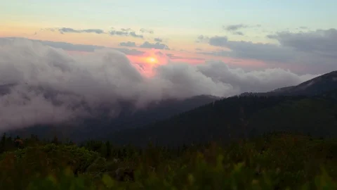 Glorious summer sunset in the mountains. Time-lapse of amazing mountain tops and Stock Footage 114316568