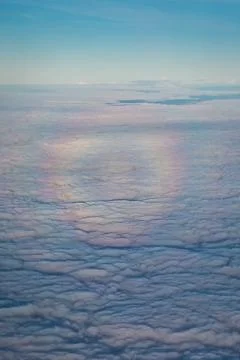 Glory around the shadow of a plane Stock Photos