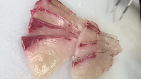 Glossy Amberjack Sashimi Slices on a White Board Close-Up (Kanpachi), Japan Stock Footage 346516158