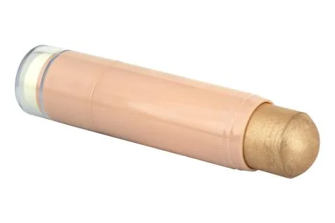 Glossy cosmetic face make-up solid foundation stick with glitter particles, t Stock Photos