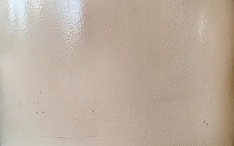 Glossy Cream Wall Texture Background with a Light Reflection 写真素材