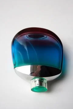 Glossy glass perfume bottle Stock Photos