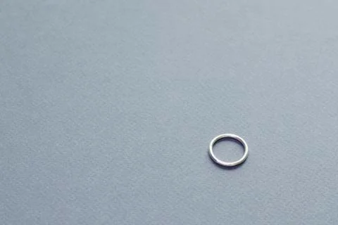 Glossy minimalistic silver ring Stock Photos