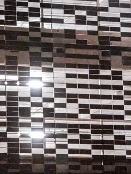 Glossy rectangular tile pattern with light reflections Fotos Stock