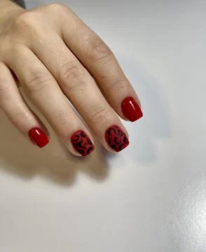 Glossy Red Leopard Print Nails Foto stock