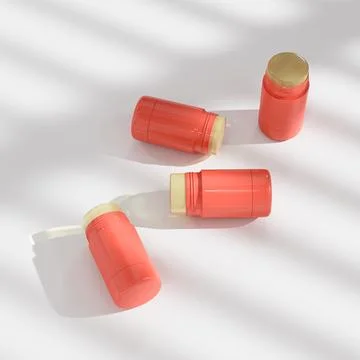 Glossy red plastic Sunscreen Stick Tubes with clear translucent cap Stock Illustration