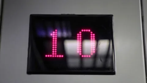 Glossy screen demonstrating red number of floor in elevator Stock Footage 145071468