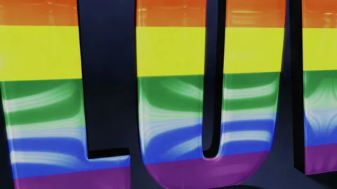 Glossy shining rainbow sign of love Video stock 125402453