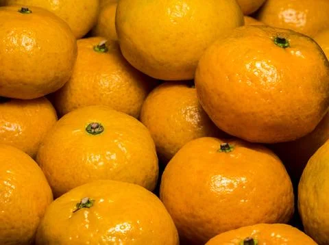 Glossy surface texture of freshness orange fruits Stock-Fotos