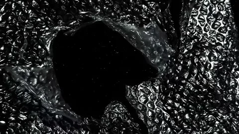 Glossy Transparent Bubble Wrap Plastic Texture Animation with Wrinkled Packaging Stock Footage 339028792