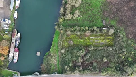 Gloucester and Sharpness canal and boats High tide on the adjacent River Severn. Stock Footage 293681657