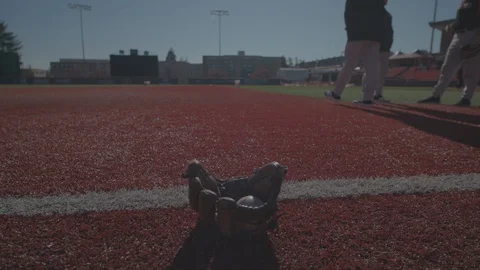 A glove on a baseball field Stock Footage 103823341