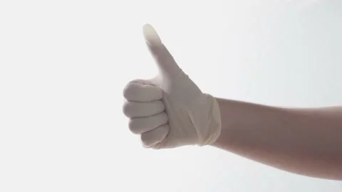 Glove on hand Stock Footage 163364843
