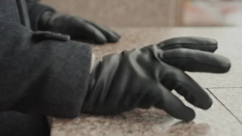 Gloved caucasian hand testing stone edge, sliding fingertips, close inspection Stock Footage 346209627