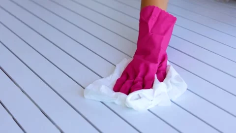 Gloved Hand Cleaning a White Surface Stock Footage 312185917