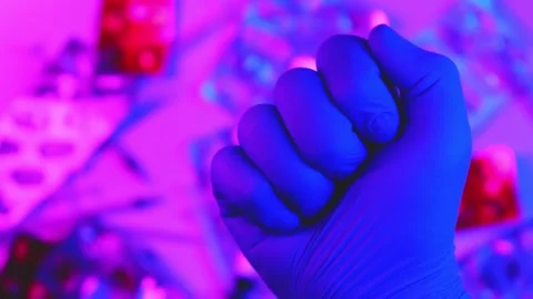 Gloved hand holding laboratory test tube vial Stock-Footage 346244844