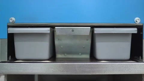 A gloved hand of a laboratory assistant takes a container with grain samples for Stock Footage 155828165