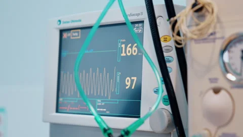 Gloved hand of a medic pressing the buttons on the screen of medical equipment. Stock Footage 241121896