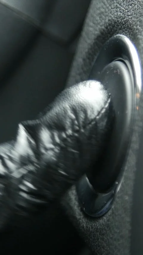 Gloved hand pressing car start stop button Stock Footage 346885353