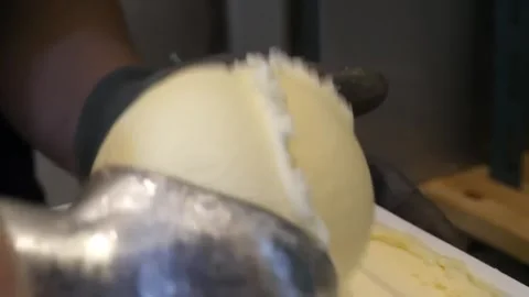 Gloved Hand Scooping Fresh Vanilla Ice Cream Close Up Stock Footage 345692852