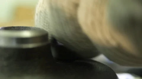 A Gloved hand Unscrews the Nut from the Bolt Stock-Footage 63863375