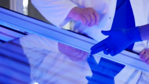 Gloved Hands Checking White Metal Profile, Blue Laboratory Light, Close Up Shot Stock Footage 341298048