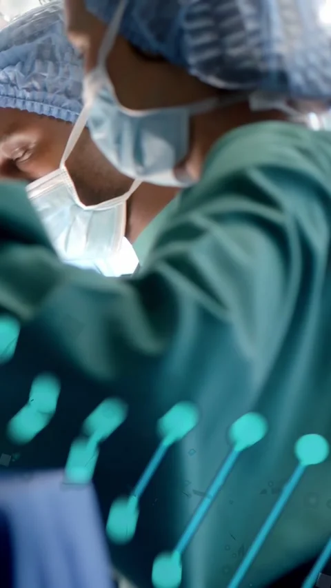Gloved hands entering frame, masked staff adjusting tools for surgery, turquoise Video stock 333020416